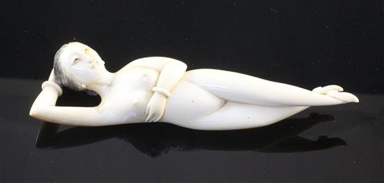 A Chinese ivory medicine figure of a nude woman, 19th century, 15cm